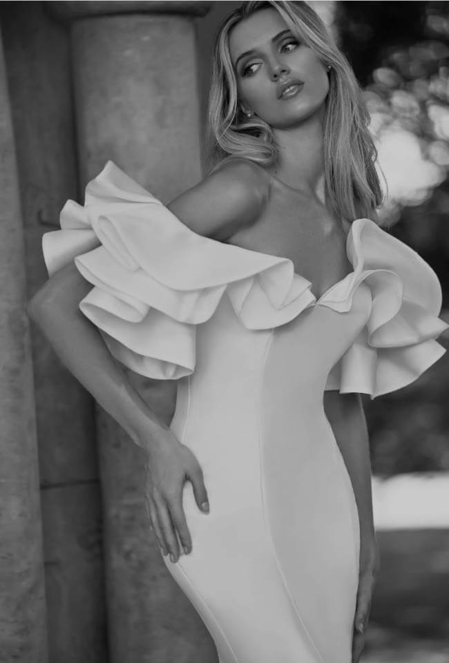 Model wearing a white gown black & white photo